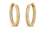 10KT Yellow Gold hoop earrings displayed side by side. Cubic zirconia accents are seen along the outside and inside of the hoop.