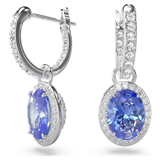 A pair of silver tone rhodium plated hoop earrings featuring oval-cut blue crystal stones surrounded by halos of small round cubic zirconia, showcasing a classic and luxurious design.