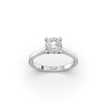 A tapered cathedral-style engagement ring with a central diamond and smaller diamonds set in a white gold band