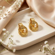Casablanca Brass Yellow Gold Plated Interlocking Stud Earrings