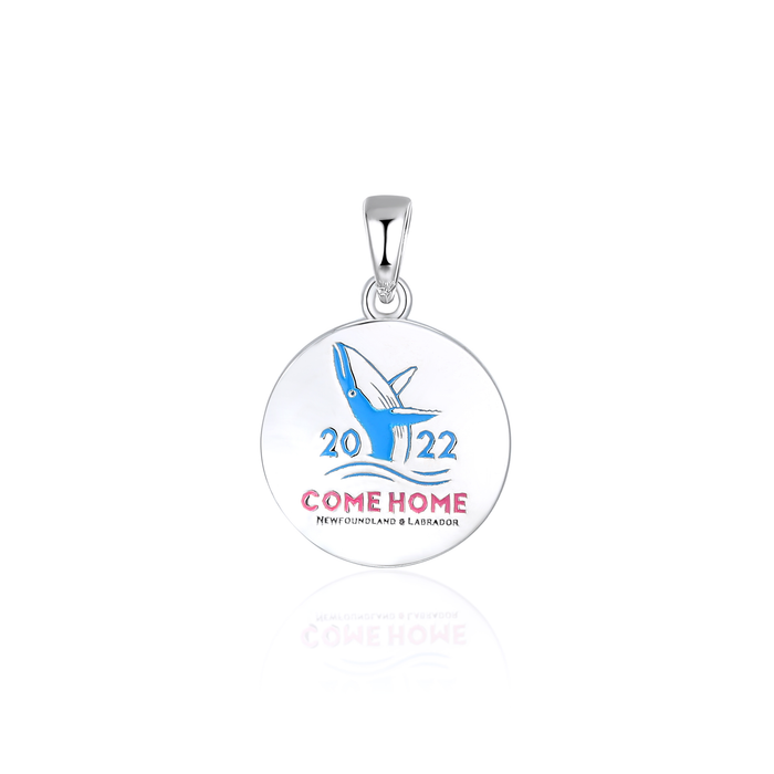 Come home year 2022 round circle pendant pictured without a chain. The design on the pendant features a blue coloured whale breaching the water with the year "2022" in blue text. Below the whale reads "Come Home - Newfoundland & Labrador"