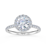 A Halo Diamond Engagement Ring with a large central diamond surrounded by a smaller diamond halo, set in a white gold band.