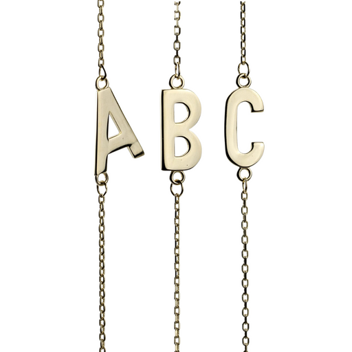 Three individual yellow gold letter pendants, 'A', 'B', and 'C', hanging on a fine chain, isolated on a white background, embodying a classic and personalized jewelry style.