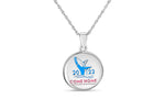 Come home year 2022 round circle pendant hung on a chain. The design on the pendant features a blue coloured whale breaching the water with the year 